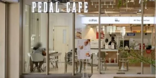 Pedal Cafe - Uptown Mall - Coffee Restaurant - Photo 1